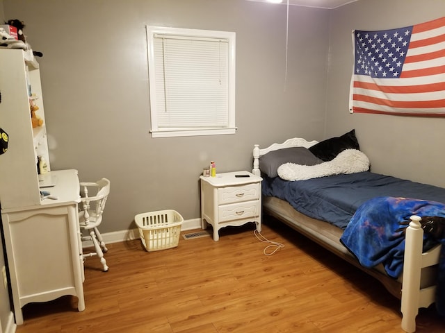 bedroom featuring light hardwood / wood-style floors