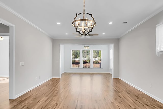 interior space with ornamental molding, light hardwood / wood-style floors, and a notable chandelier