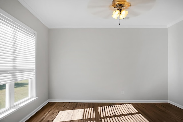 unfurnished room featuring dark hardwood / wood-style floors, ceiling fan, and ornamental molding