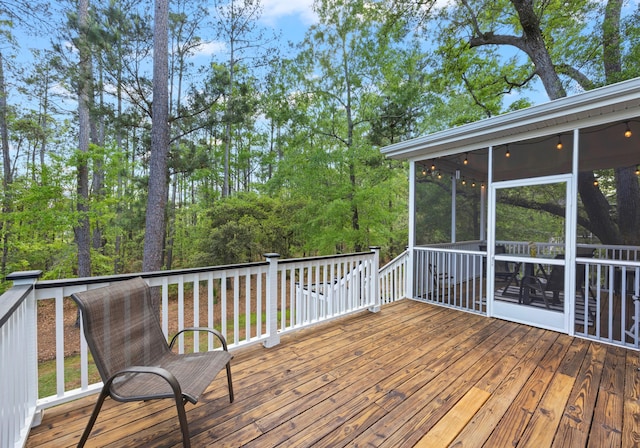 wooden terrace with a sunroom