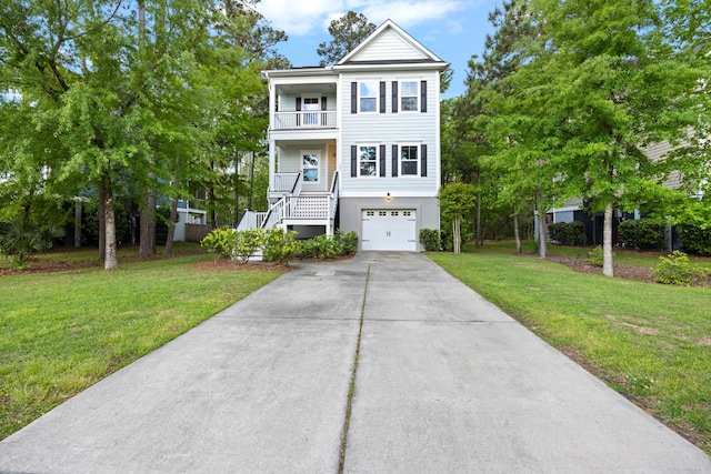coastal home featuring a balcony, driveway, a garage, a front lawn, and stairs