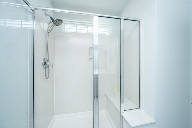 full bathroom featuring a stall shower