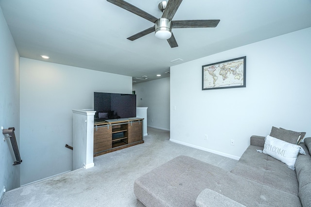 living area featuring recessed lighting, ceiling fan, baseboards, and carpet