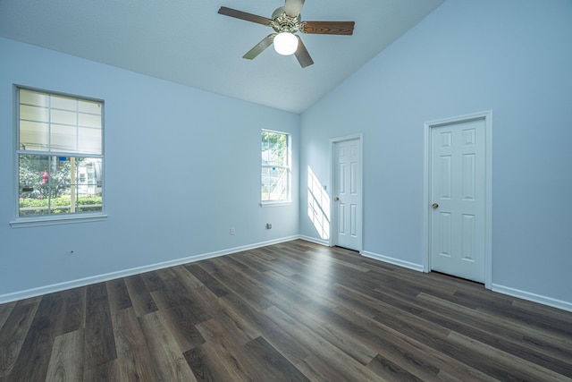 spare room featuring ceiling fan, lofted ceiling, and dark hardwood / wood-style floors