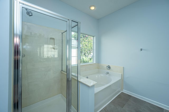 bathroom with independent shower and bath