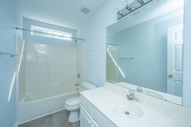 full bathroom featuring shower / washtub combination, toilet, a textured ceiling, and vanity