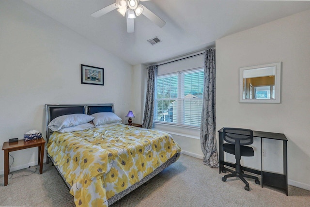 carpeted bedroom with lofted ceiling and ceiling fan