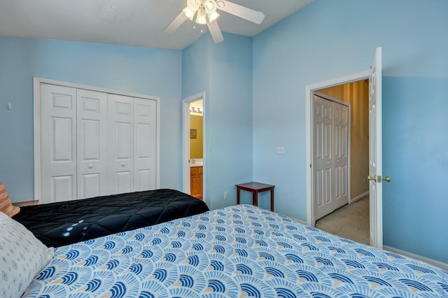 carpeted bedroom featuring ceiling fan, lofted ceiling, and a closet