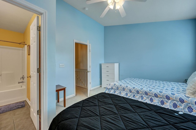 bedroom featuring light tile patterned floors and ceiling fan