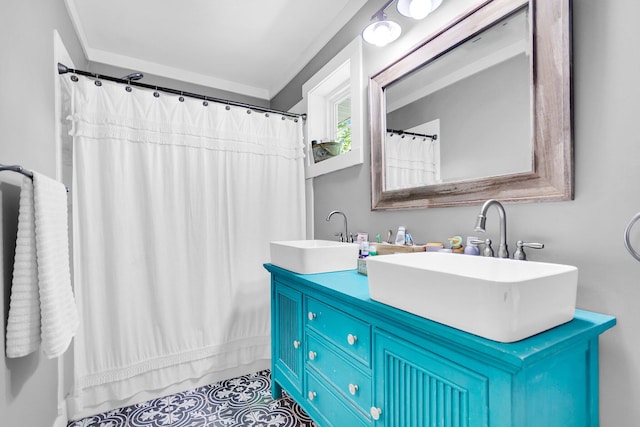 bathroom featuring vanity and curtained shower