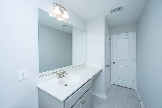 bathroom featuring vanity and tile patterned flooring