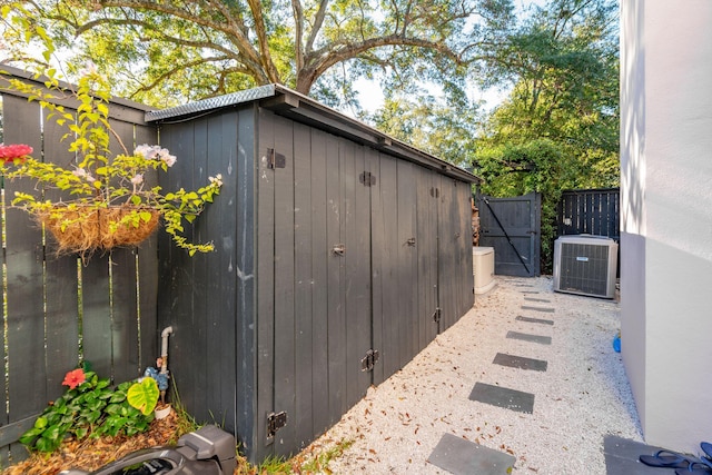 view of outbuilding featuring central AC unit