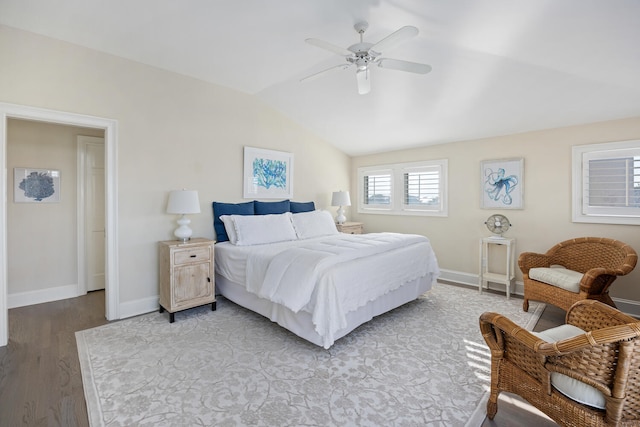 bedroom with lofted ceiling, ceiling fan, and hardwood / wood-style floors