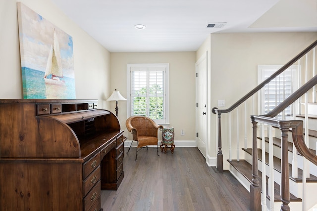 living area with wood-type flooring