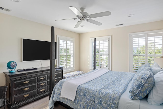 bedroom featuring ceiling fan and light hardwood / wood-style floors