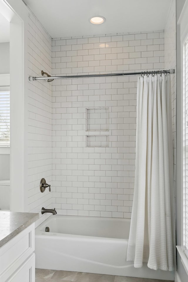 full bathroom with vanity, recessed lighting, and shower / tub combo