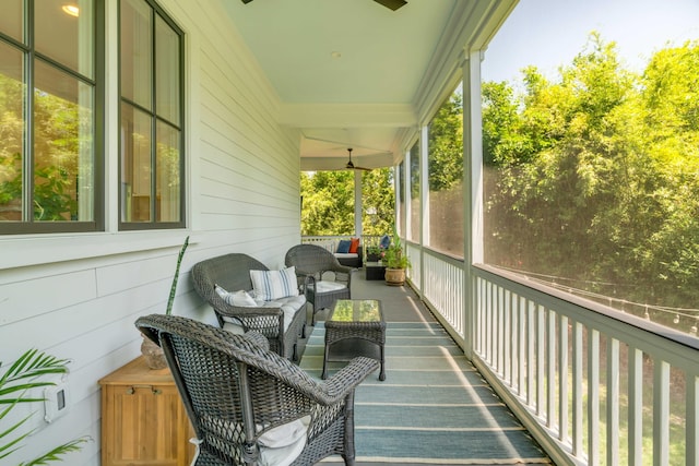 exterior space featuring ceiling fan and an outdoor living space