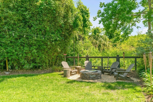 view of yard featuring a fire pit