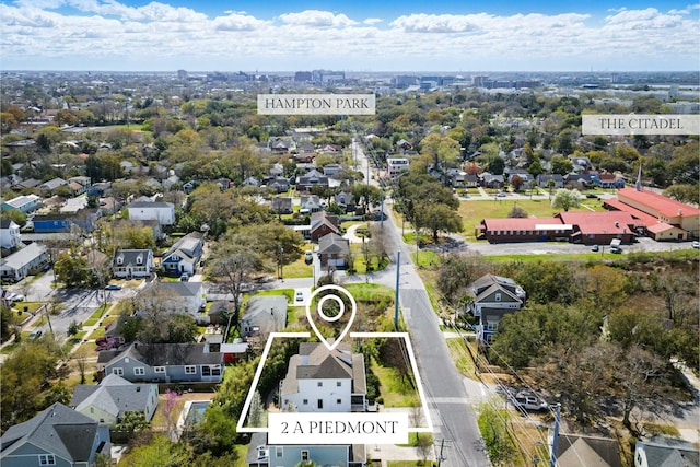 birds eye view of property with a residential view
