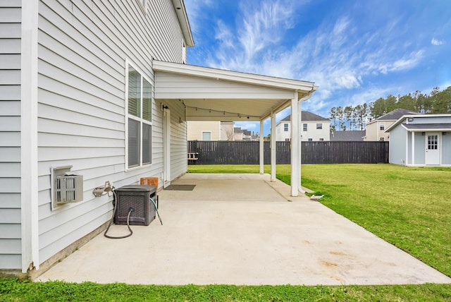 view of patio / terrace with a storage unit