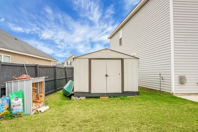 view of outbuilding with a yard