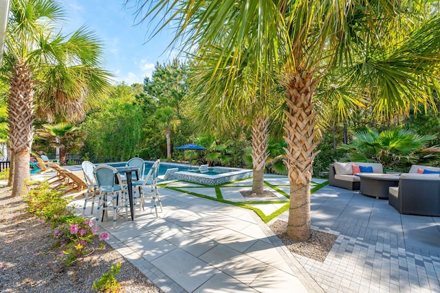 view of patio with an outdoor pool, a jacuzzi, an outdoor living space, and outdoor dining space