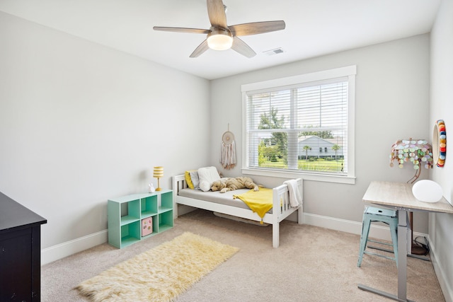 bedroom featuring visible vents, carpet flooring, baseboards, and ceiling fan
