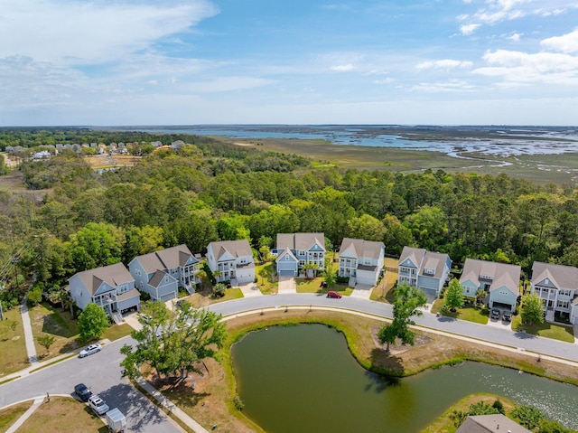 bird's eye view featuring a water view and a residential view