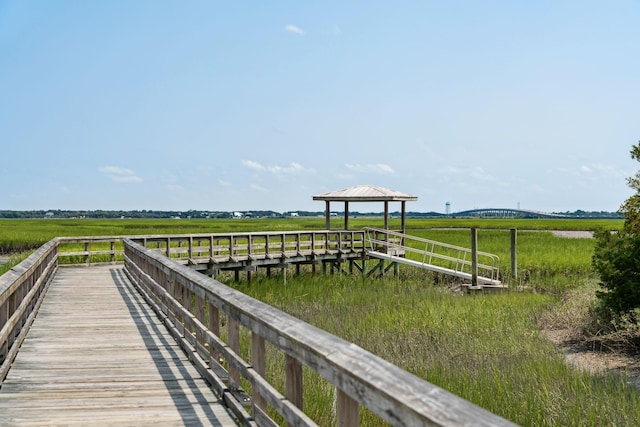 dock area with a gazebo and a rural view
