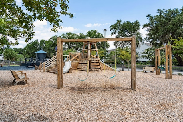 view of jungle gym with fence