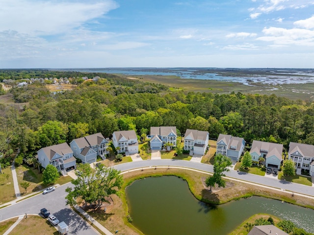 aerial view with a residential view and a water view