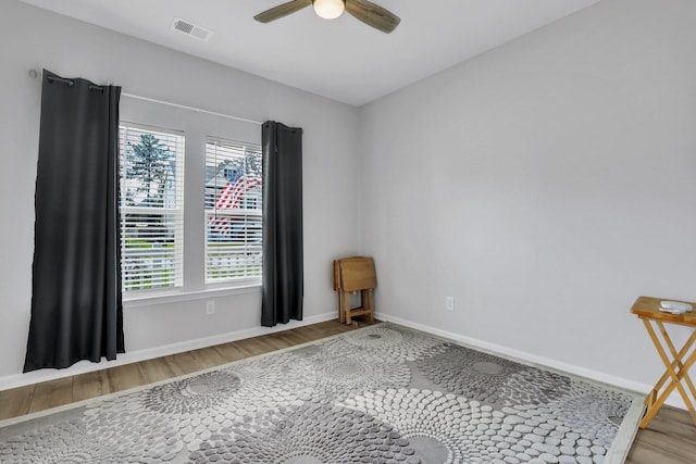 516 Yellow Leaf Ln, Summerville, SC 29486 - spare room with visible vents, baseboards, ceiling fan, and wood finished floors