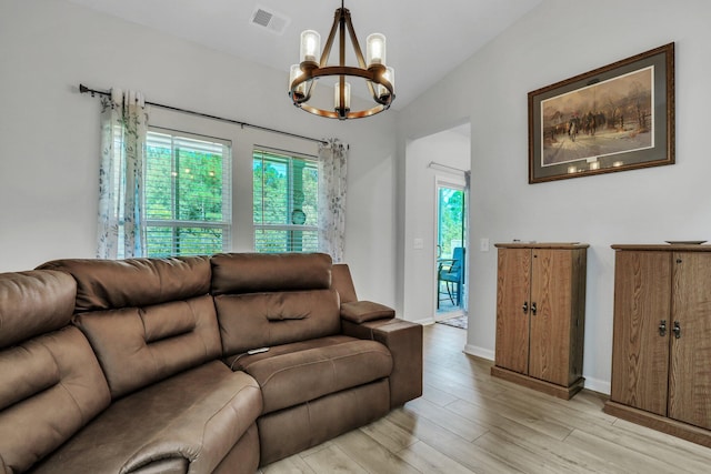 516 Yellow Leaf Ln, Summerville, SC 29486 - living room with lofted ceiling, a healthy amount of sunlight, visible vents, and light wood finished floors