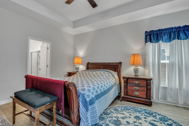516 Yellow Leaf Ln, Summerville, SC 29486 - bedroom with light wood-type flooring, baseboards, ensuite bathroom, and a ceiling fan