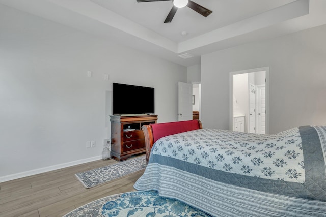 516 Yellow Leaf Ln, Summerville, SC 29486 - bedroom with a raised ceiling, a ceiling fan, wood finished floors, connected bathroom, and baseboards