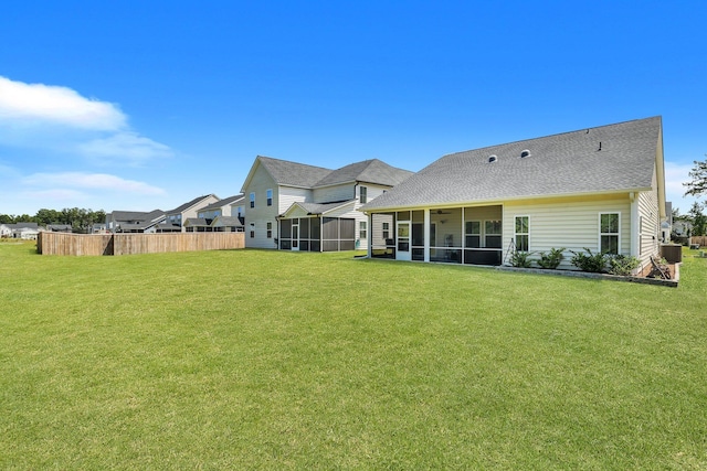 516 Yellow Leaf Ln, Summerville, SC 29486 - rear view of property featuring a lawn, fence, and a sunroom