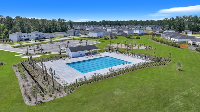 516 Yellow Leaf Ln, Summerville, SC 29486 - pool featuring a patio area, fence, a residential view, and a lawn
