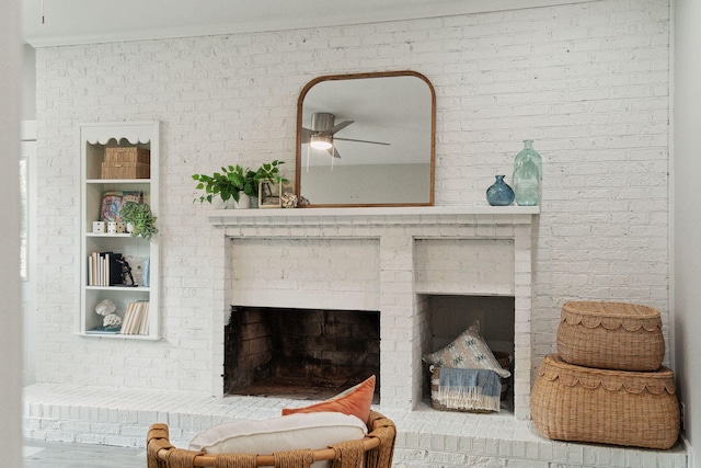 room details with a fireplace and a ceiling fan