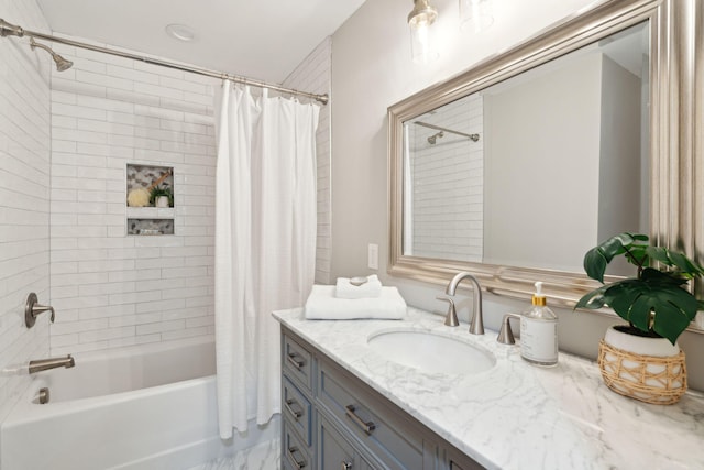 bathroom with shower / bath combo with shower curtain and vanity