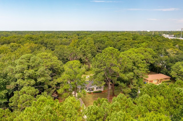 aerial view with a wooded view