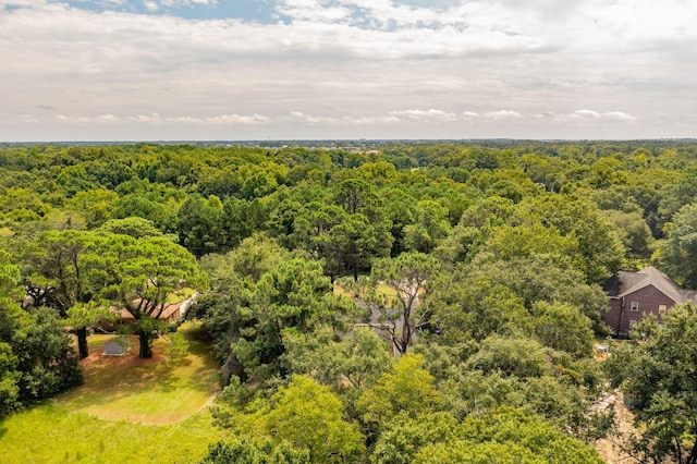 drone / aerial view with a forest view