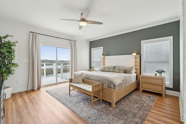 bedroom with baseboards, ornamental molding, a ceiling fan, access to exterior, and light wood-style flooring