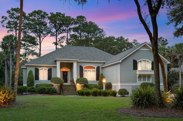 view of front of home featuring a yard