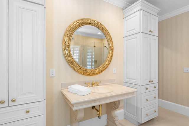 bathroom with ornamental molding, sink, tile patterned floors, and walk in shower