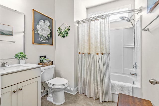 full bathroom featuring vanity, shower / tub combo, and toilet