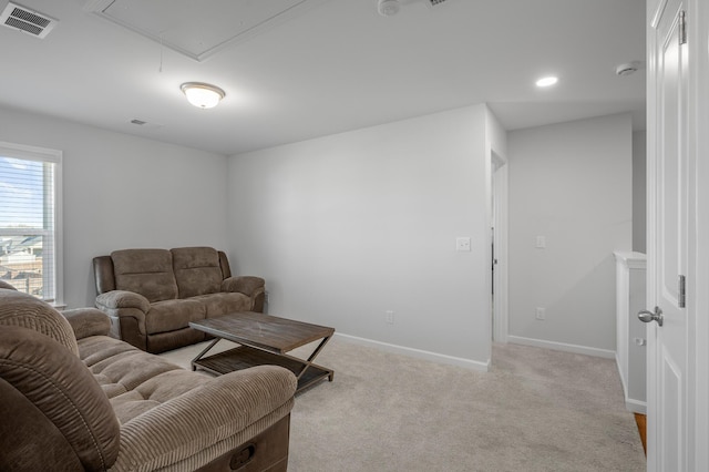 living room featuring light colored carpet