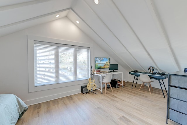 interior space with light hardwood / wood-style flooring and lofted ceiling