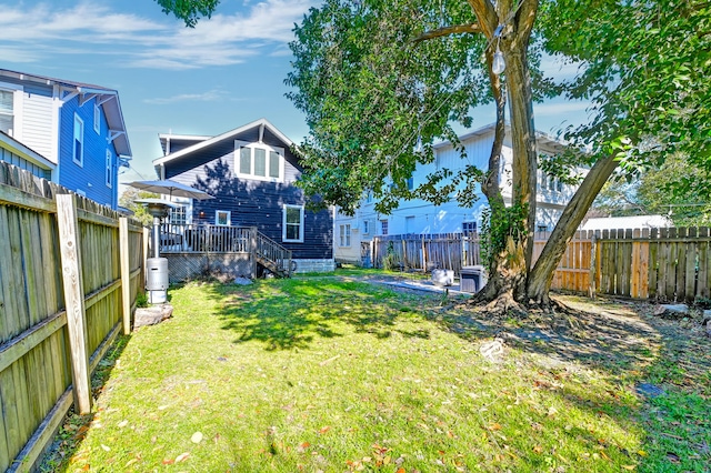 view of yard featuring a deck