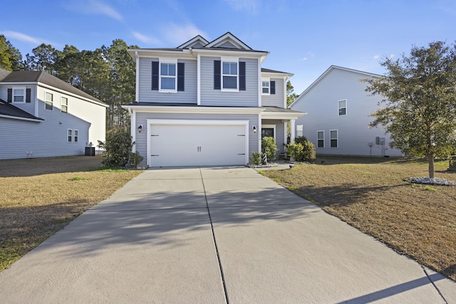 view of front of home featuring a garage, driveway, a front lawn, and central AC unit