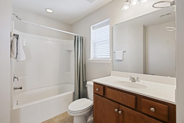 full bathroom with shower / tub combo with curtain, visible vents, toilet, vanity, and tile patterned flooring